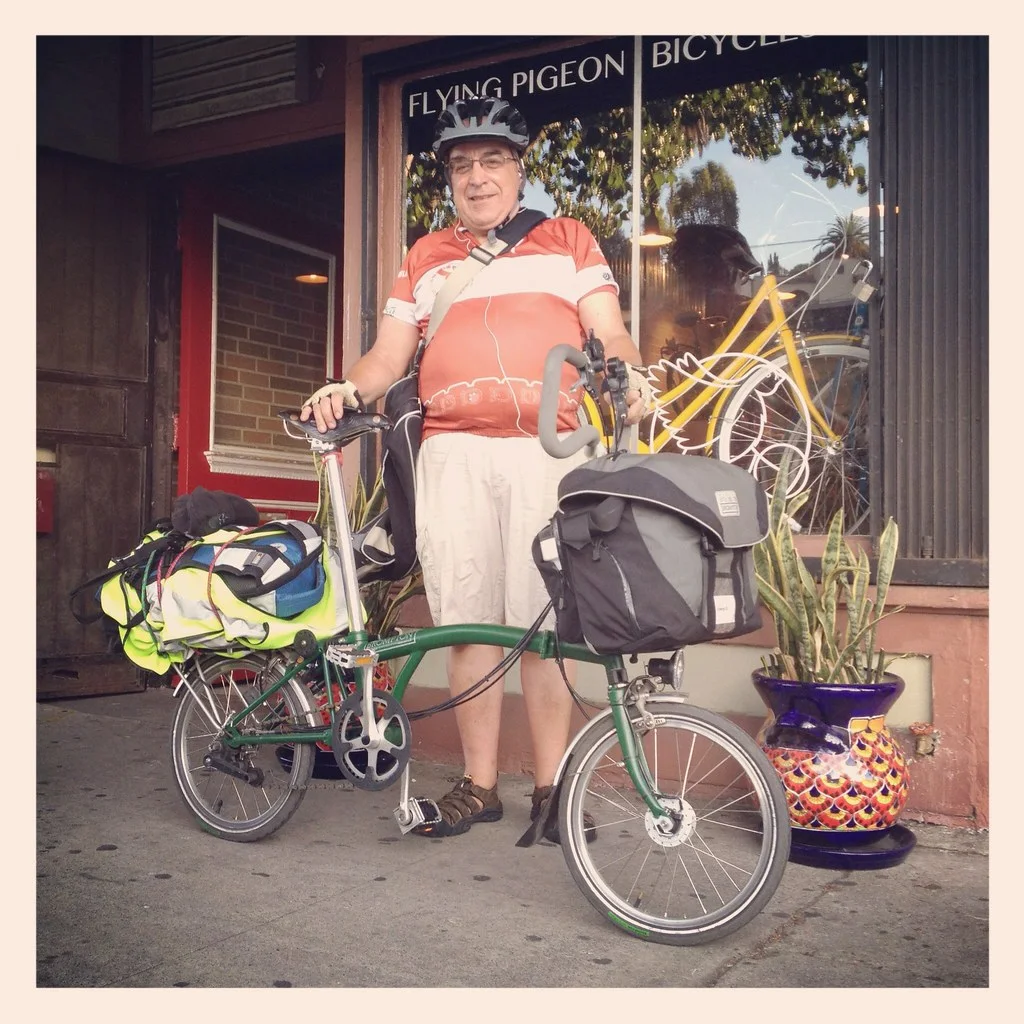 Brompton Folding Bicycle: A compact bicycle with small wheels, a hinge line, narrow frame, and folding proportions.