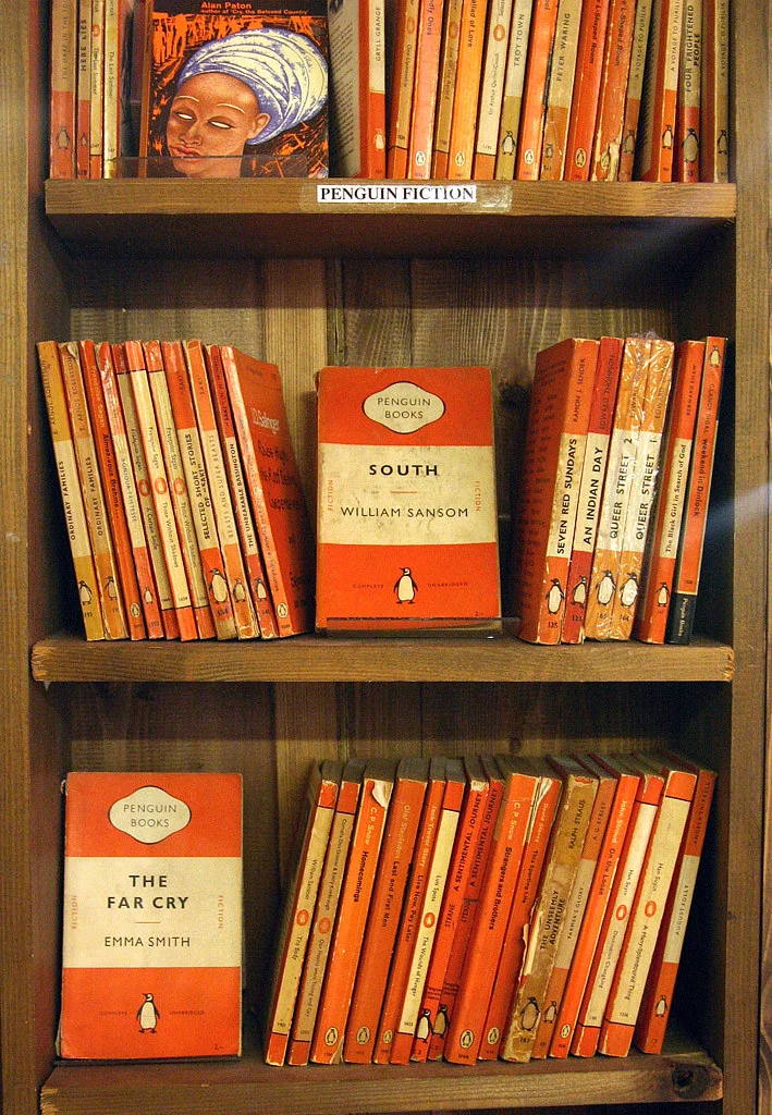 Penguin Tri-Band Paperback: A compact paperback cover with horizontal colour bands, typography, and a small publisher mark.